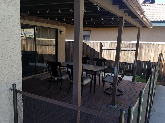 Backyard covered patio pool Guardian fence