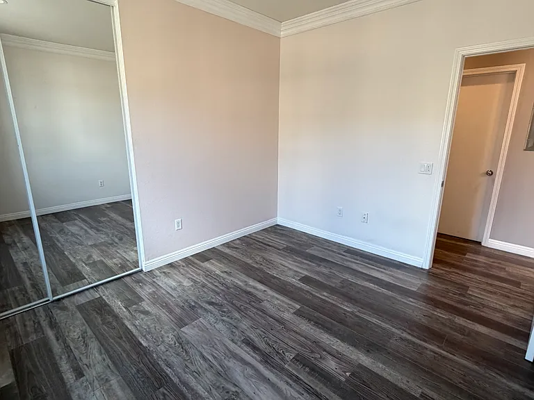 Comfortable second bedroom with spacious closet and beautiful views.