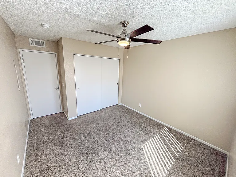 2 bedroom - 2 bathroom apartment:
-guest bedroom with sliding 2 door closet and ceiling fanlight