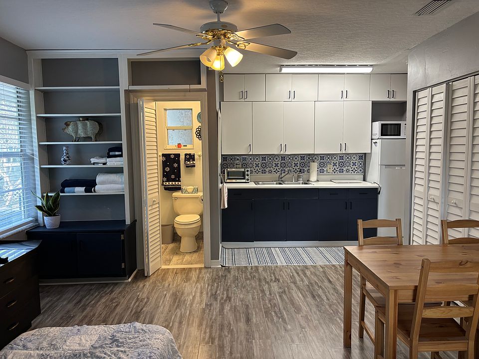 Lots of cabinets and shelves for storage.