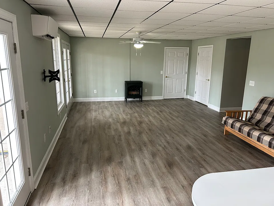 Large open living area with propane fire place