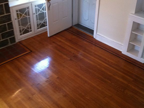Original hardwood floors and custom built in storage.