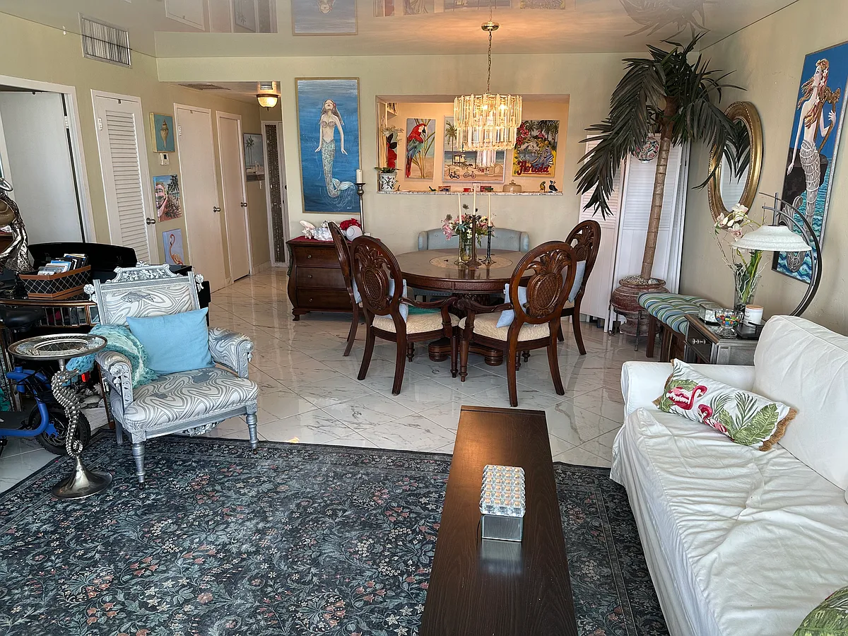 View of living, dining and kitchen - 3111 N Ocean Dr #903