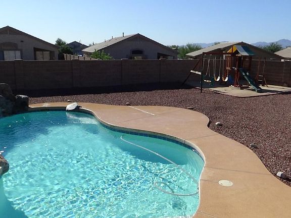 Back yard whit custom private pool.