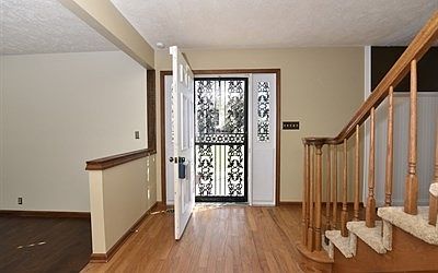 Inviting entry with wood floors