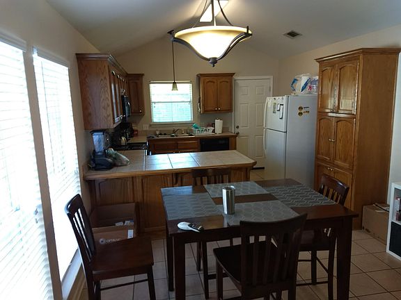 Den looking into kitchen
