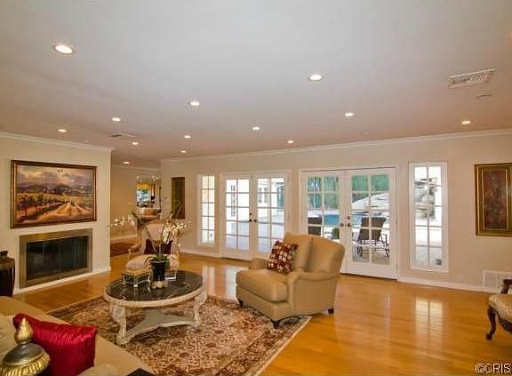 Formal Living Room with Fireplace and set of French Doors