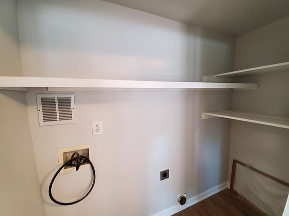 Closet with washing machine hookup