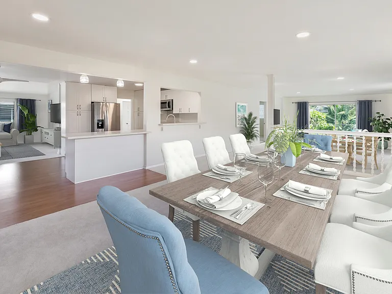 Dining big enough for a gang--or use as flex space. Looking left into kitchen and living room beyond. Looking back, is the family room with 2 sets of sliding door. It opens to large covered lanai. (Primary bedroom back left.)