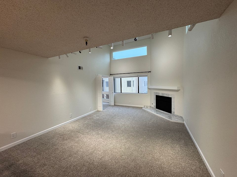 Living area with high ceilings