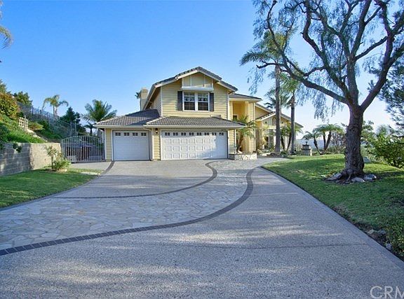 Desirably set back on a cul-de-sac street ... with meandering paths leading you to entry door!