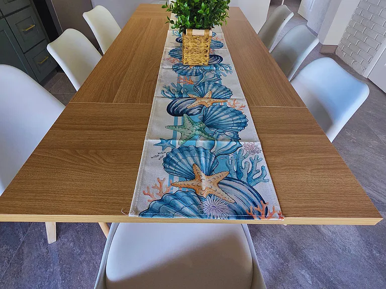 Coastal table decor with starfish-inspired runner