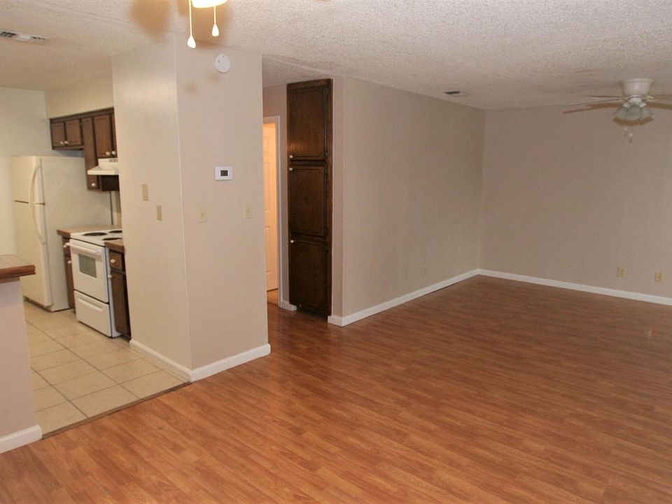 The living room opens up to the dining area