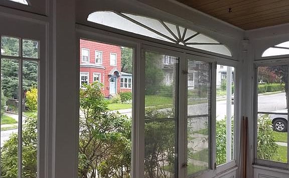 Enclosed front porch.