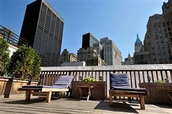 Sold by Douglas Elliman | media 12