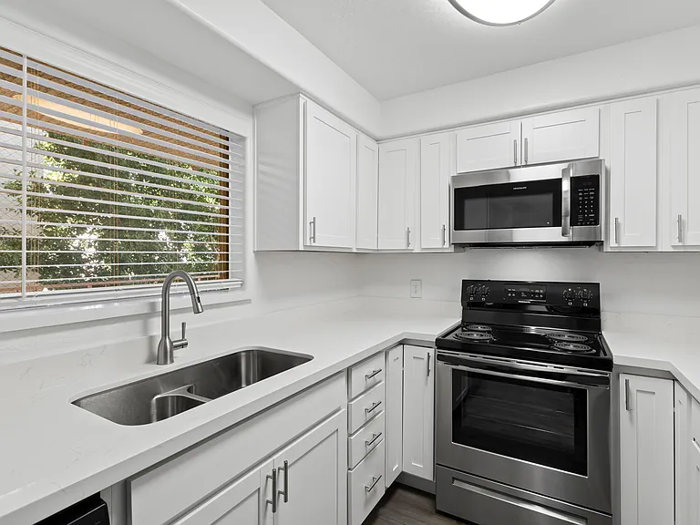 Remodeled Kitchen, includes Soft Close Cabinets, Quartz Countertops, and Stainless Steel Appliances.