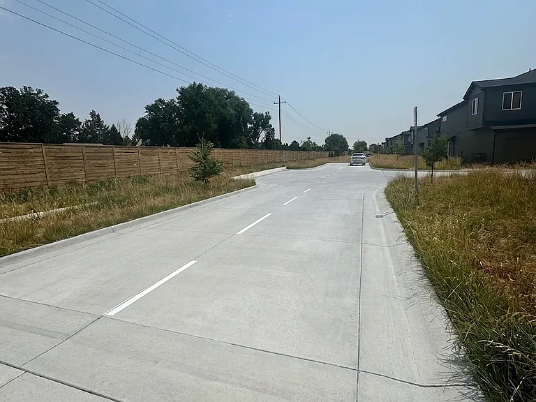 Another angle of the additional private lot that is located next to the garages. 6 parking spaces that are almost always open. Great for guests!