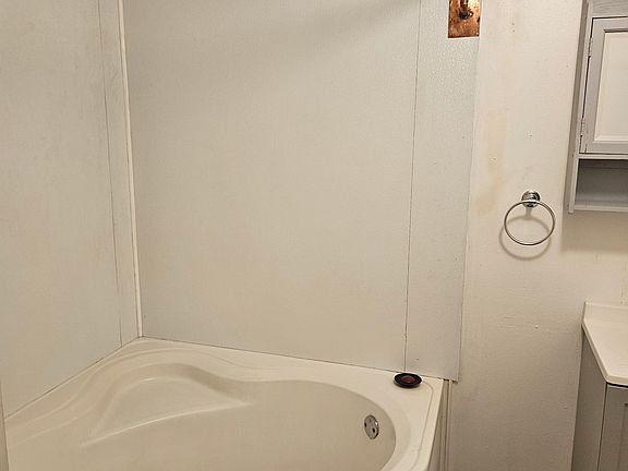 This functions as a stand-up shower and tub.