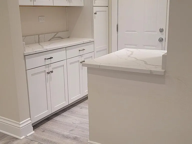 Kitchen entry view with self-closing doors/drawers