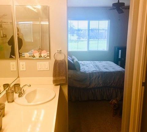 View from master bathroom into master bedroom.