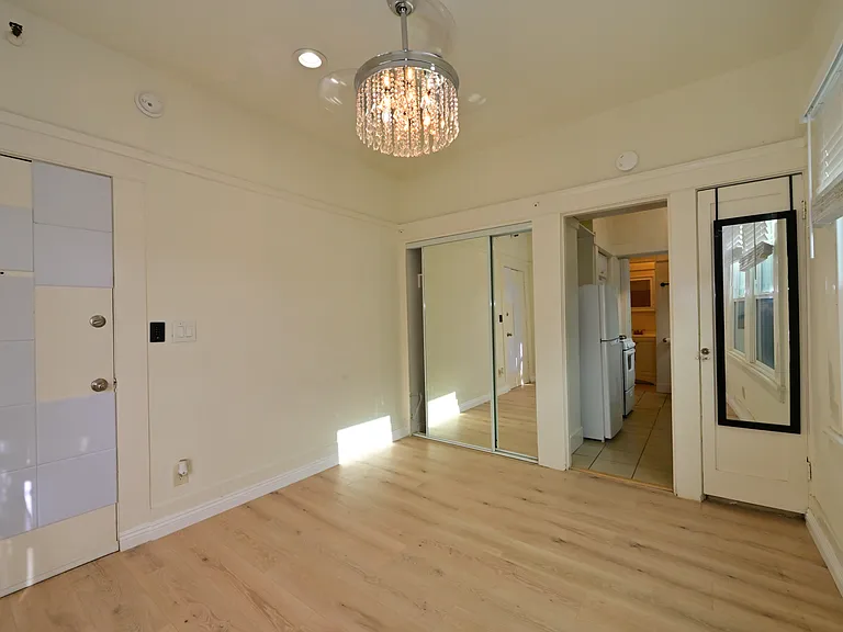 FULLY UPGRADED Studio + private balcony with Ocean view, New flooring, almost new everything, with in-unit laundry!