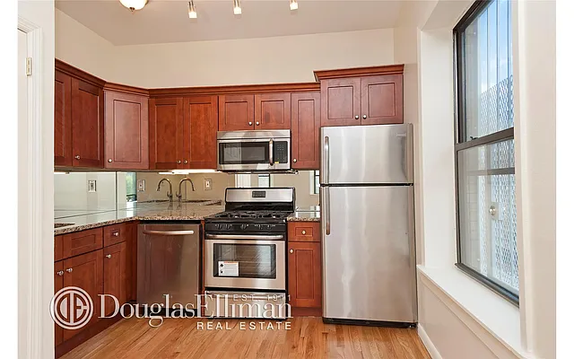 Sold by Douglas Elliman | media 11