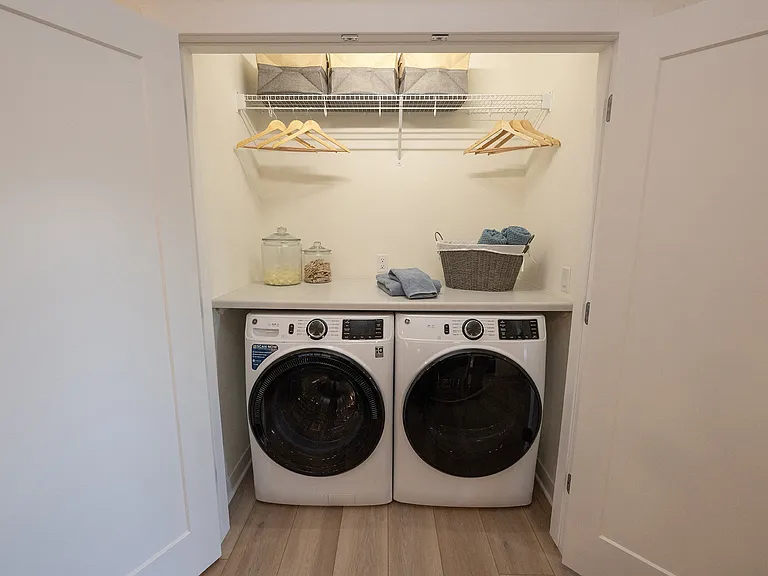 Washer & Dryer with Folding Station in Apartment