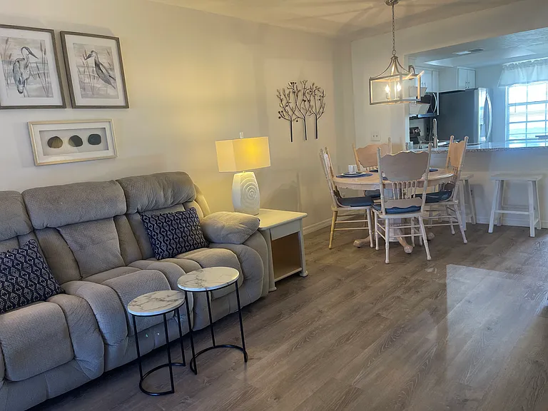 Living and dining room. There is a large screen tv in this room as well. Spectrum internet is included in your rent.