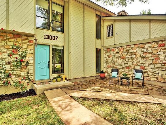 Great patio spaces in front and back for relaxing and entertaining.