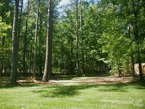 Ready to use with new water and electric hook-ups, new septic system, and new gravel pad for your ca