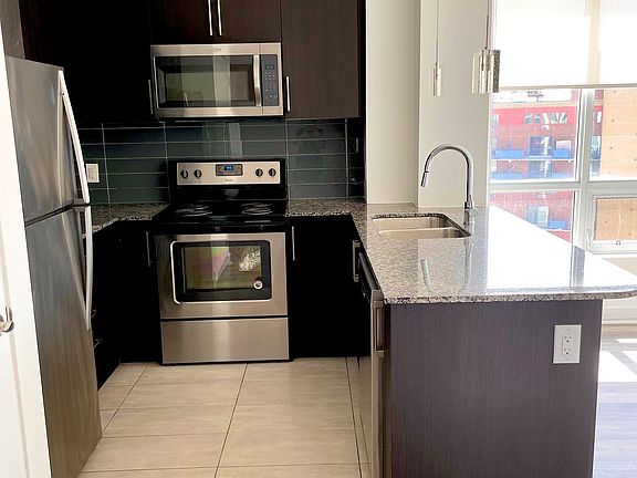 2nd image of 840 Queens Plate Dr #1402
