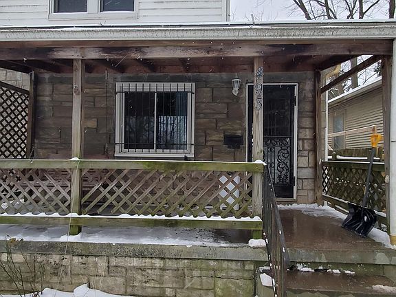 Recent picture of the front porch 1/17/2022. There is a porch swing included.