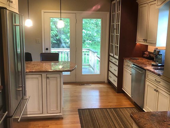 Kitchen View 2 (entering from dining room). Oven and microwave are to the left of the refrigerator