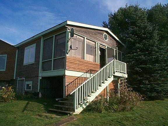 end of house with porch