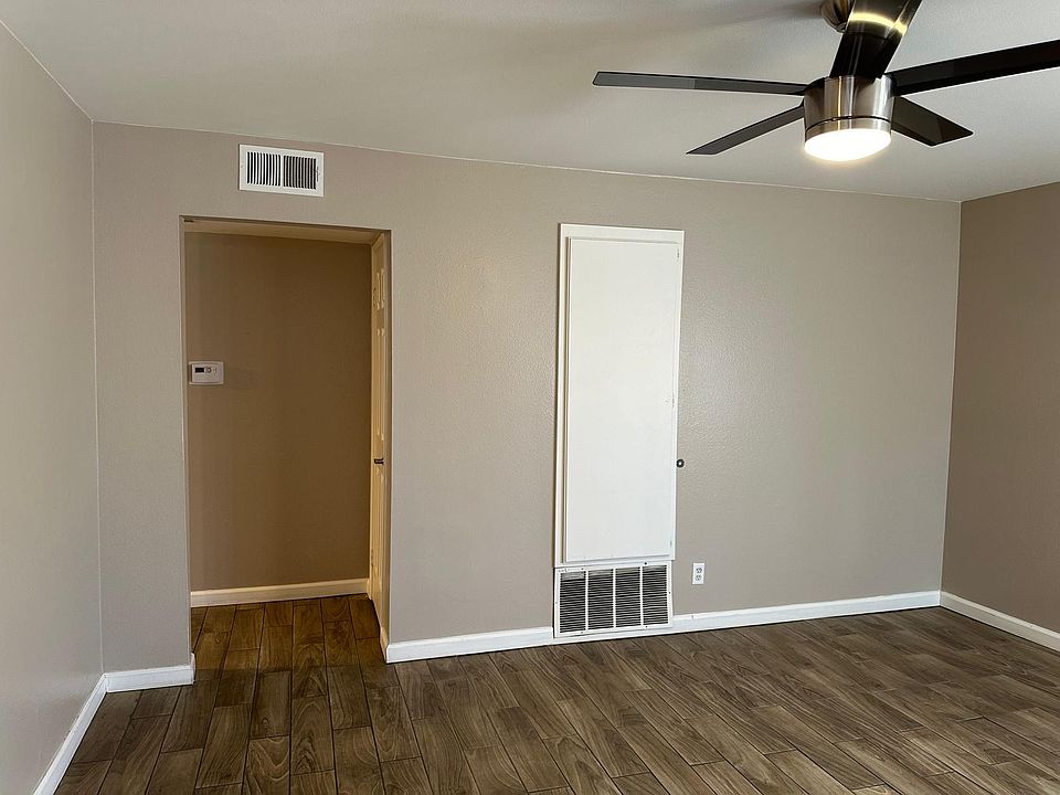 Living/Family Room with a remove controlled cieling fan/LED light.