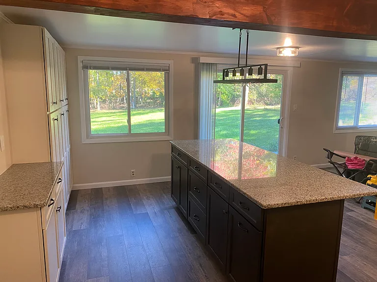 Kitchen island with patio fort and large windows