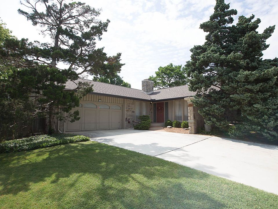 2 Car heated garage with work area.