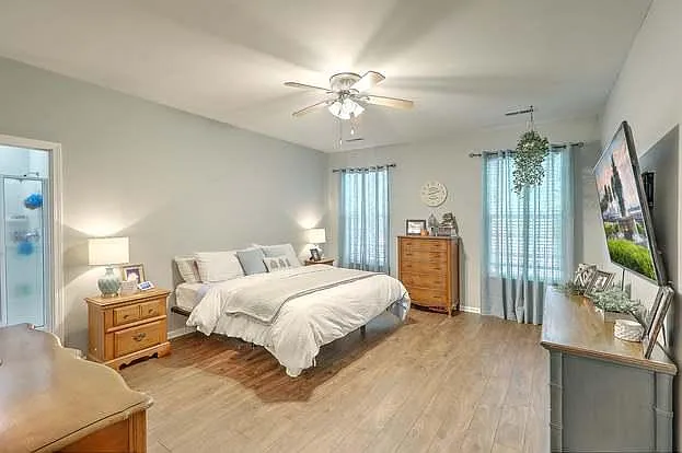 Downstairs master bedroom includes two large wall in closets