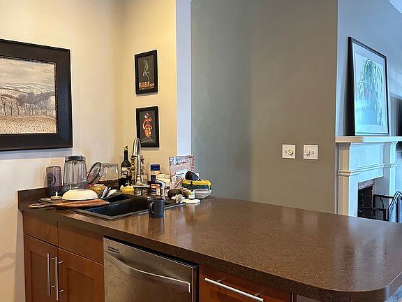 Kitchen with dishwasher, microwave, and garbage disposal