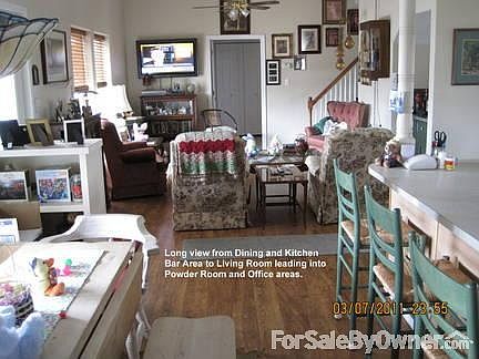 Long View of Breakfast Bar & Living Room
						:
						View from Breakfast Bar & Dining Table through Living Room.