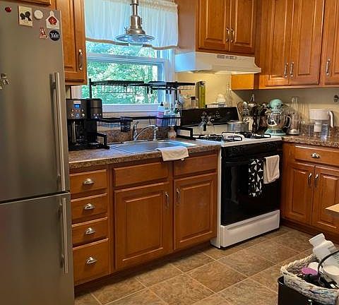 Kitchen with wood cabinets