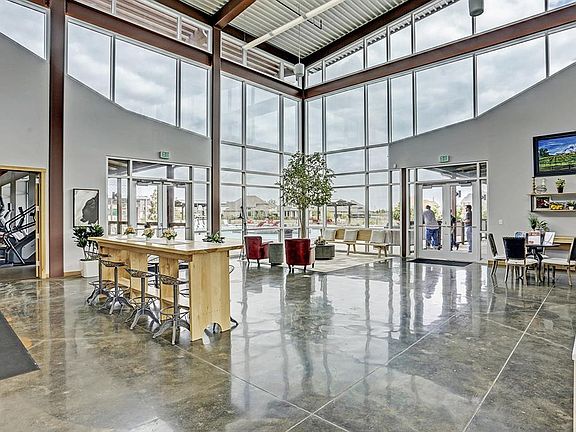 The farmhouse features the event hall, pool, splash pad and fitness center. There is absolutely no need to leave the community for your entertainment.