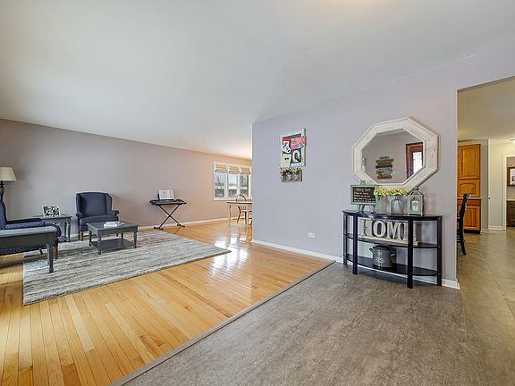 Enter Through the Foyer to the Living Room