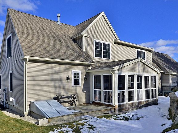 Screened sunroom, stone walls