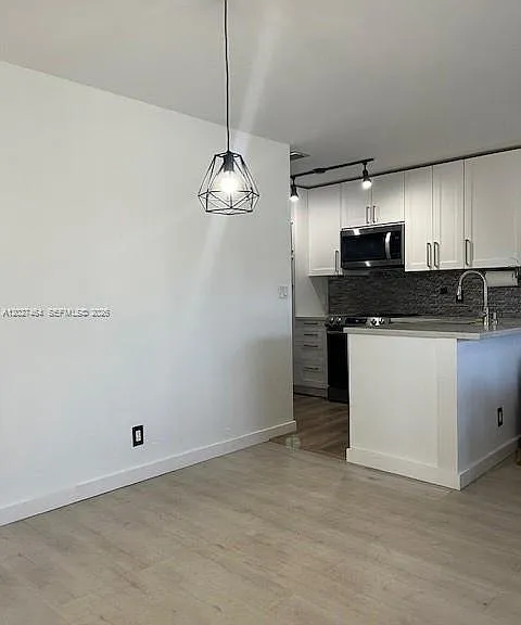 10054 Winding Lake Rd #201 — Photo 6