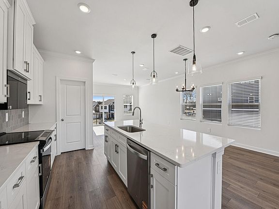 Cook your favorite meals in the spacious, modern kitchen.