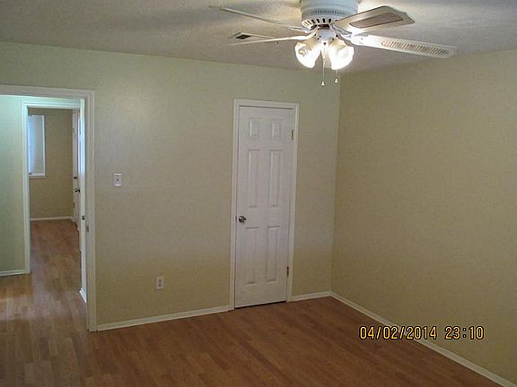A DIFERRENT VIEW OF MASTER BEDROOM OFFERS A RECTANGULAR WINDOW AND CEILING FAN WITH LIGHT