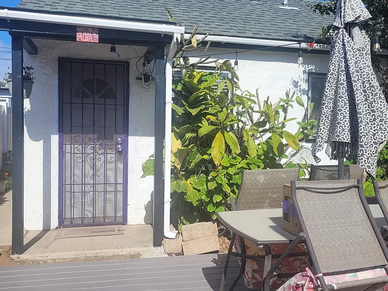 Front door and shared patio space