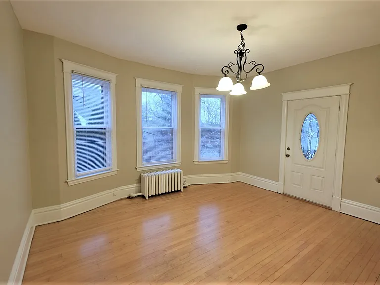 Welcome to Central Lakes of Uptown, where elegant living meets comfort. This spacious, sunlit living area features large windows and modern finishes, perfect for relaxing or entertaining. Schedule a tour today to envision your new home!