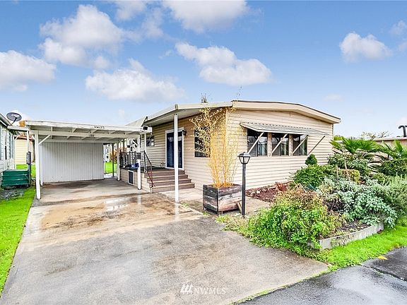 Carport with storage and parking for 2